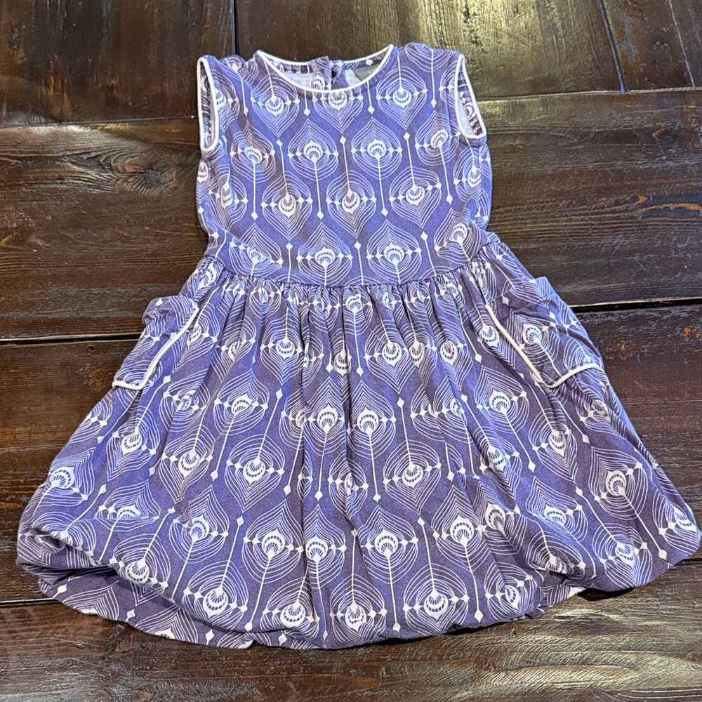Kate Quinn Purple Dress with Peacock Pattern